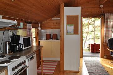 Фото номера Коттедж эконом-класса с видом на озеро Дома для отпуска Hinders Cottages г. Науво 16